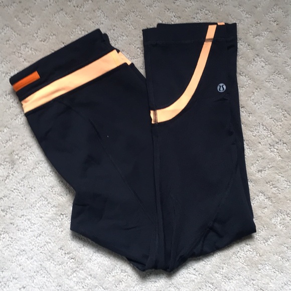 lululemon athletica Pants - Lululemon Run: Inspire Crop II in Black/Orange Pop